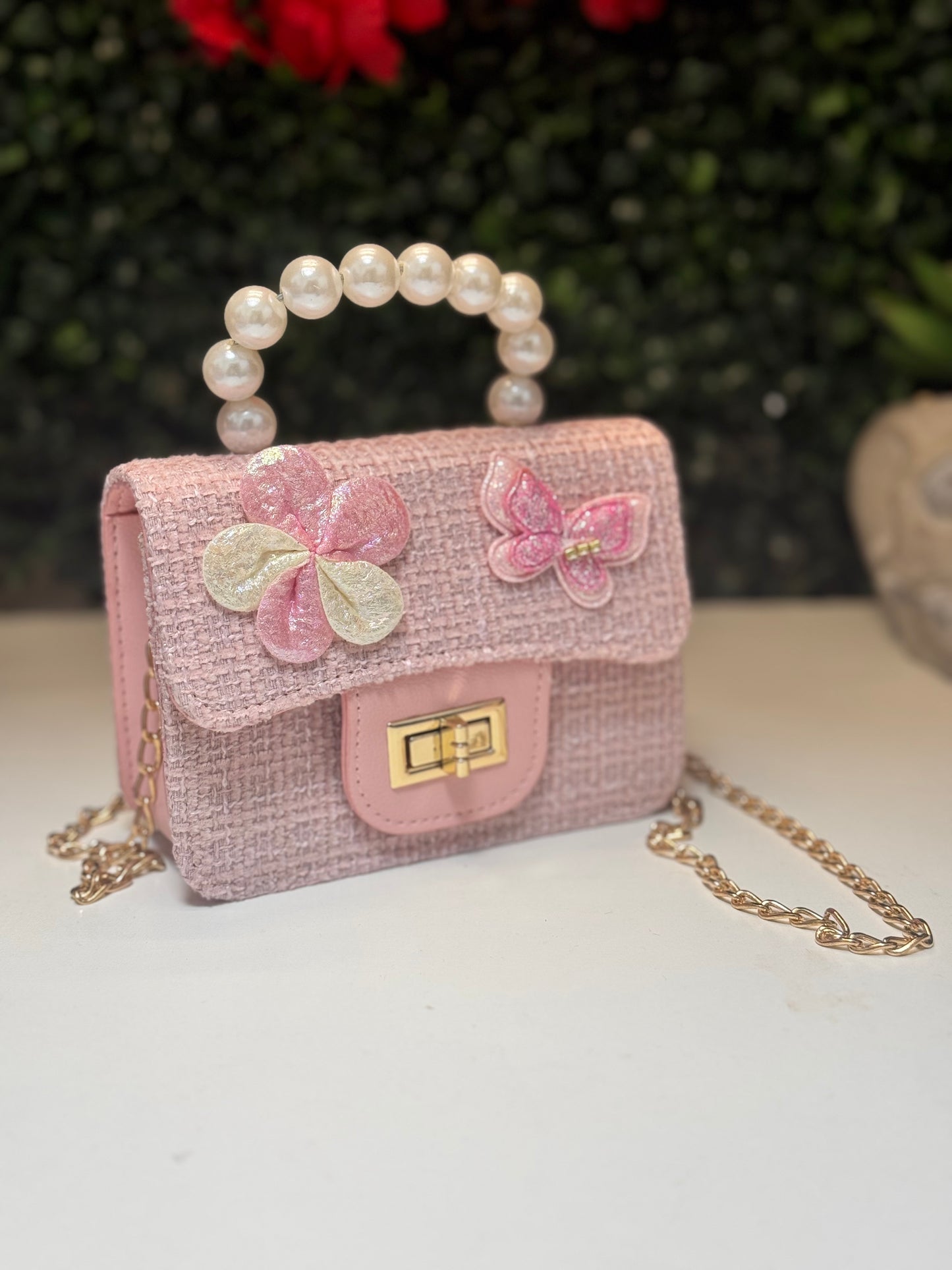 Pearly pink purse