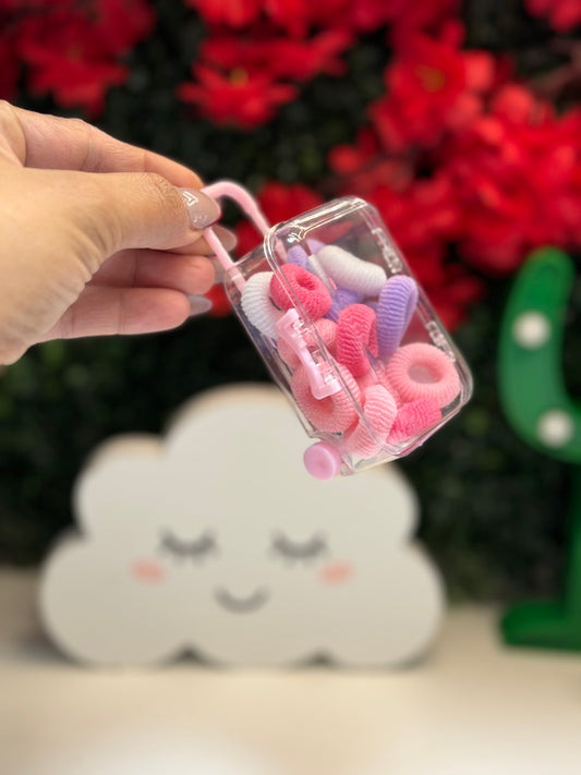 Suitcase hair ties